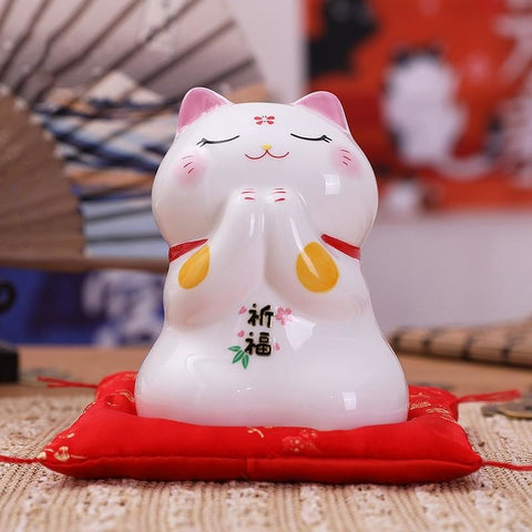 https://sakura-japon.com/cdn/shop/products/Maneki-Neko-Ceramica-Bendicion-Frente_480x480.jpg?v=1648761365